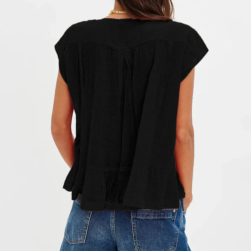 Kiana | Elegant Feminine Sleeveless Blouse with Lace Trim and Ruffle Hem