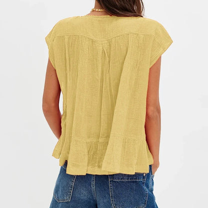 Kiana | Elegant Feminine Sleeveless Blouse with Lace Trim and Ruffle Hem