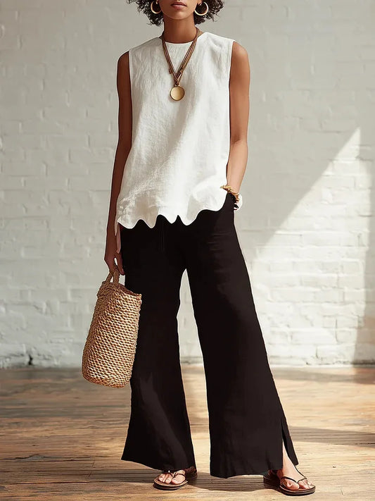 Aubrielle | Elegant Flowy Sleeveless Blouse Top with Irregular Hem