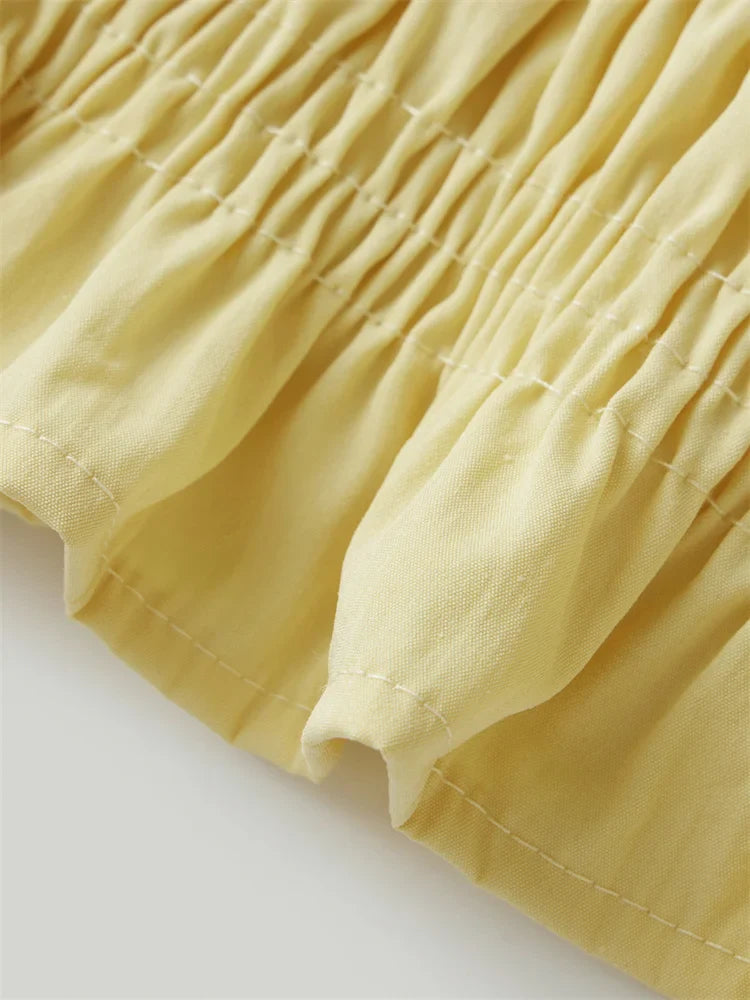 Abigail | Elegant Sleeveless Blouse Top with Soft Ruffle Hem for Everyday